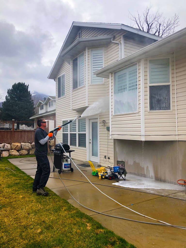 Safely washing the vinyl siding on a home in Bountiful.